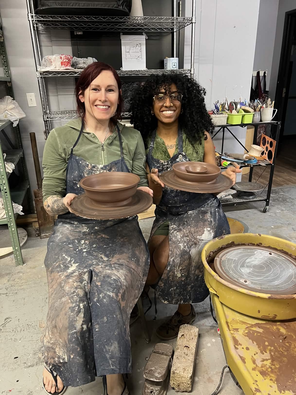 Students with their wheel-thrown bowls